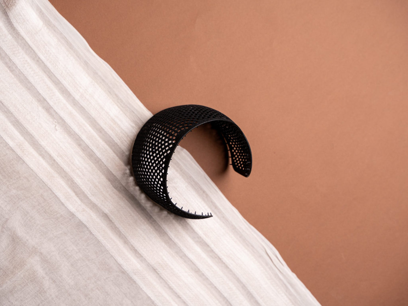 Ikleel Crown resting on fabric
